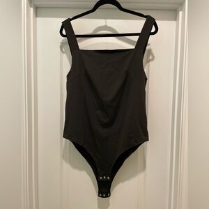 *SLEEVELESS BODYSUIT* (NEVER WORN)